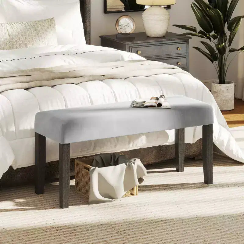 Banc de chambre rembourré avec assise capitonnée et pieds en bois massif pour salle à manger