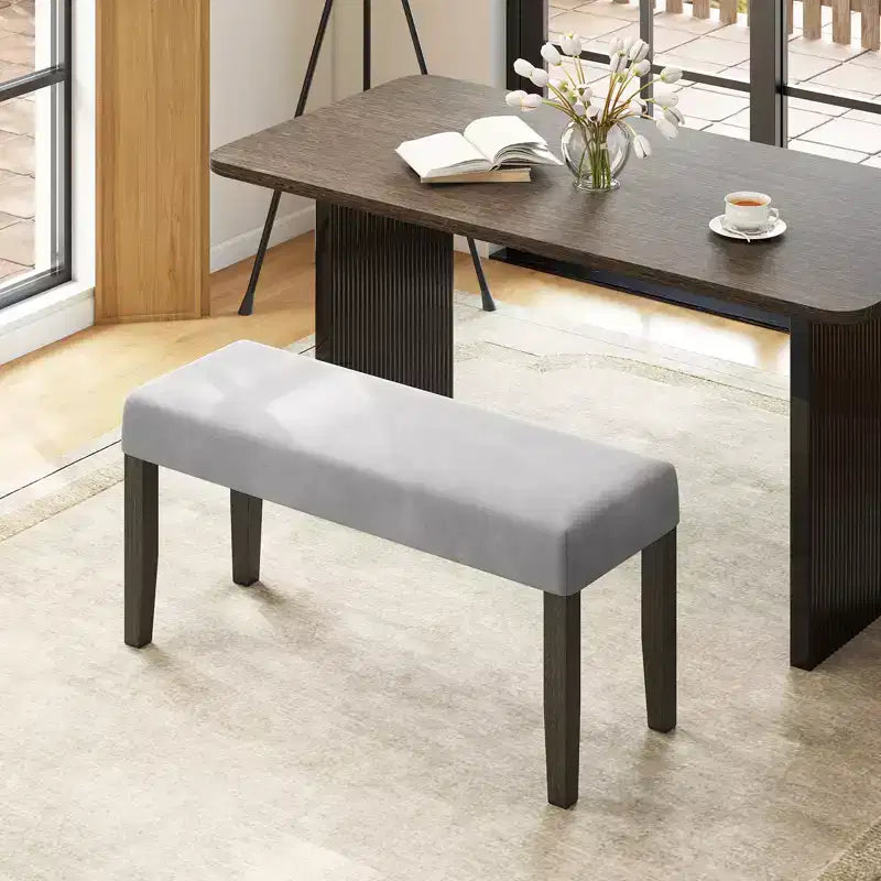 Banc de chambre rembourré avec assise capitonnée et pieds en bois massif pour salle à manger