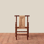 Fauteuil – la tradition artisanale du bois tourné et du cannage dégage un air raffiné et artisanal