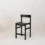 Tabouret de comptoir - Noir - la pièce avec son assise en cuir non traité se patine avec l'âge au lieu de produits chimiques et se moule au cadre en bois au fil du temps, juste...